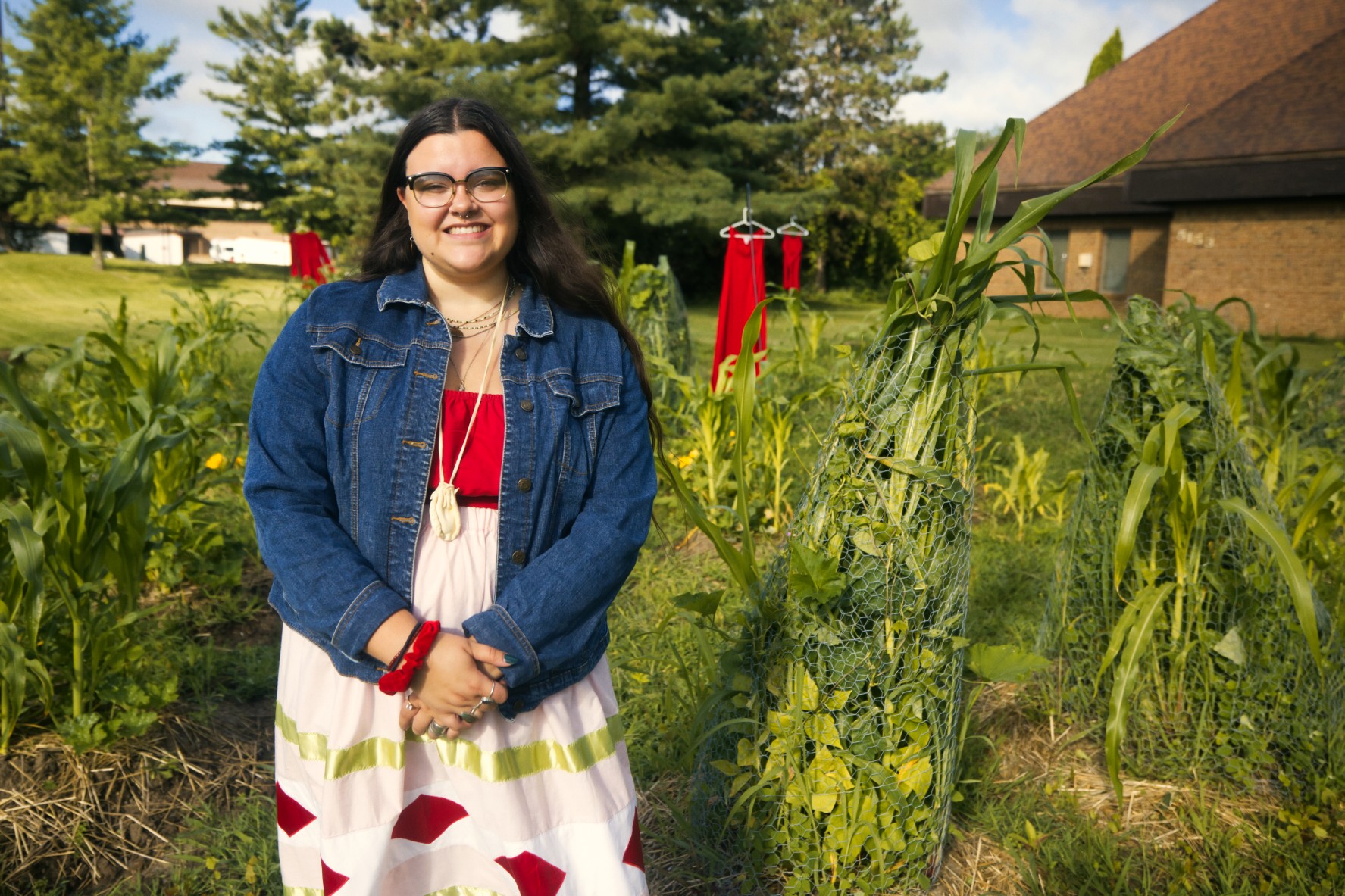 Mikayla Thompson standing in the 3 Sisters Garden