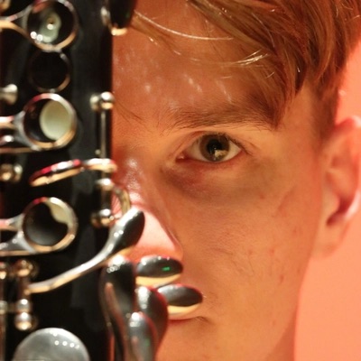 Tyler Mazone with an instrument.