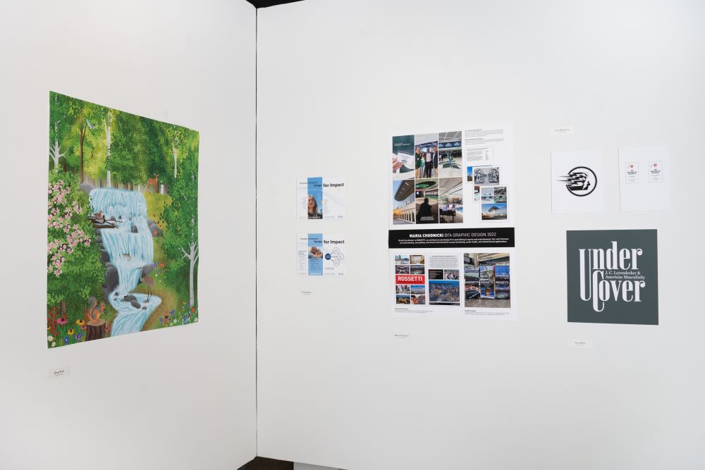 An art gallery exhibition space showcasing a nature-inspired wildlife art piece on the wall on the left and marketing materials and logos on the wall on the right.